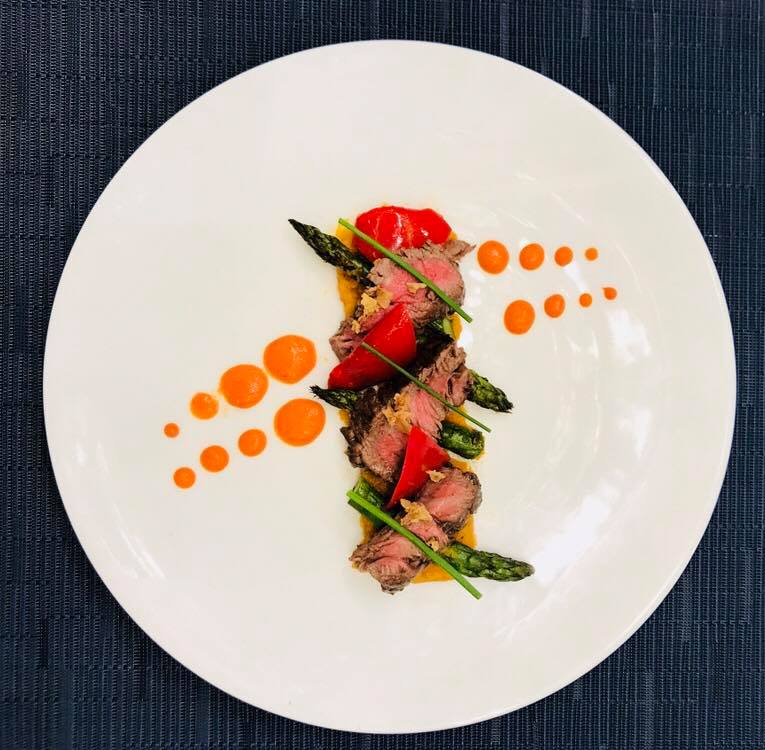 Beef in Soy, Sweet Potato Crush, Roast Red Pepper with Coulis & Asparagus .